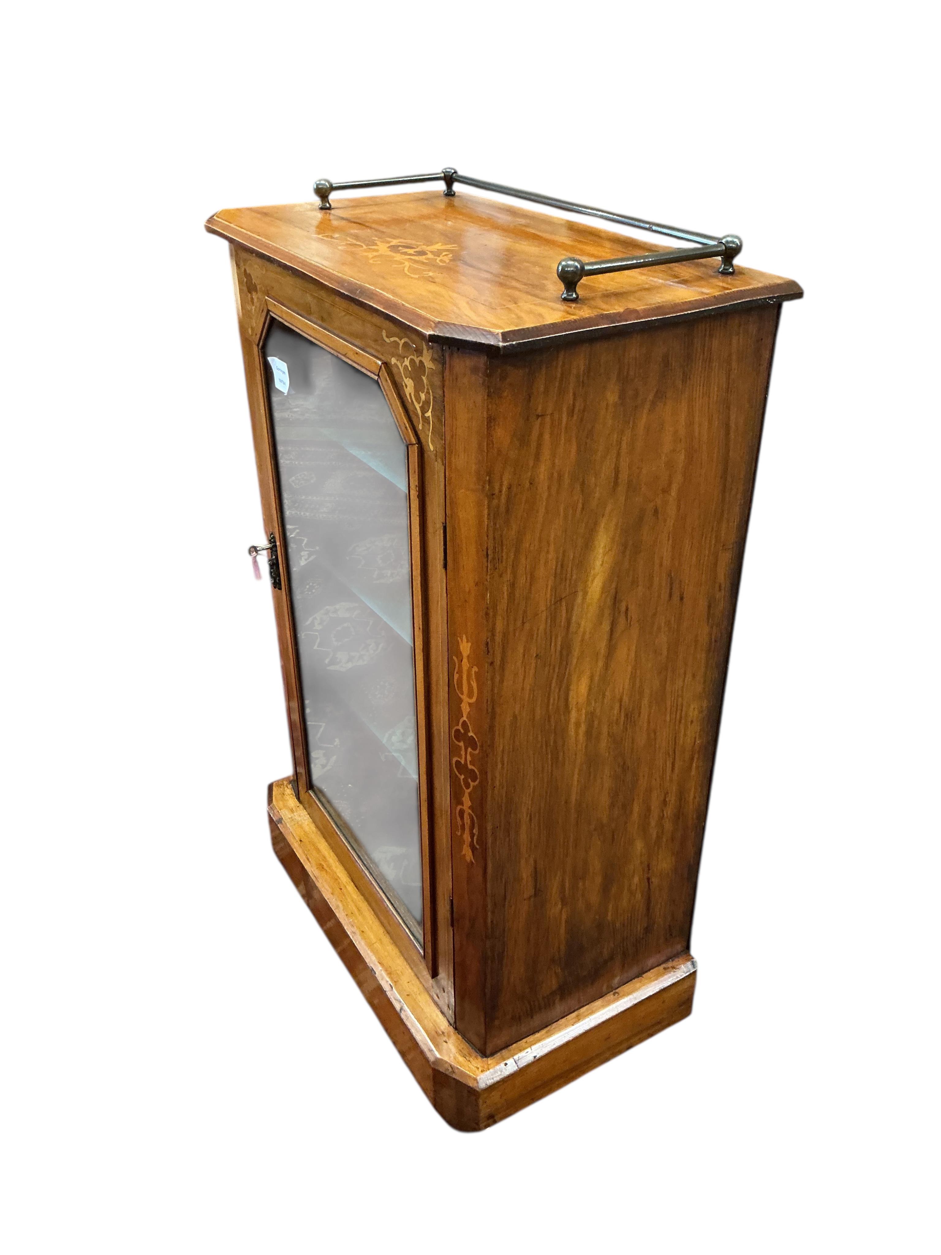 A late Victorian inlaid walnut music cabinet, width 57cm, depth 31cm, height 88cm